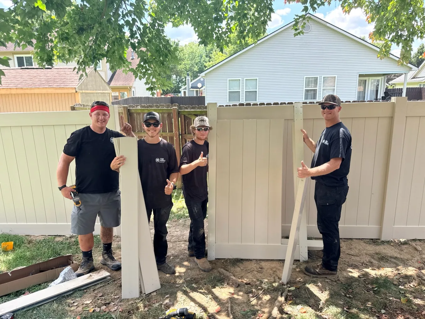 The Fence Company Frankfort crew installing a vinyl privacy fence